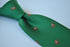 dark green tie with horse racing design